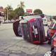 Illustration for article titled Just Another Day In L.A. As Cadillac Flips Over Yaris